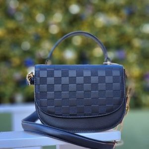 Leather purse with two straps.